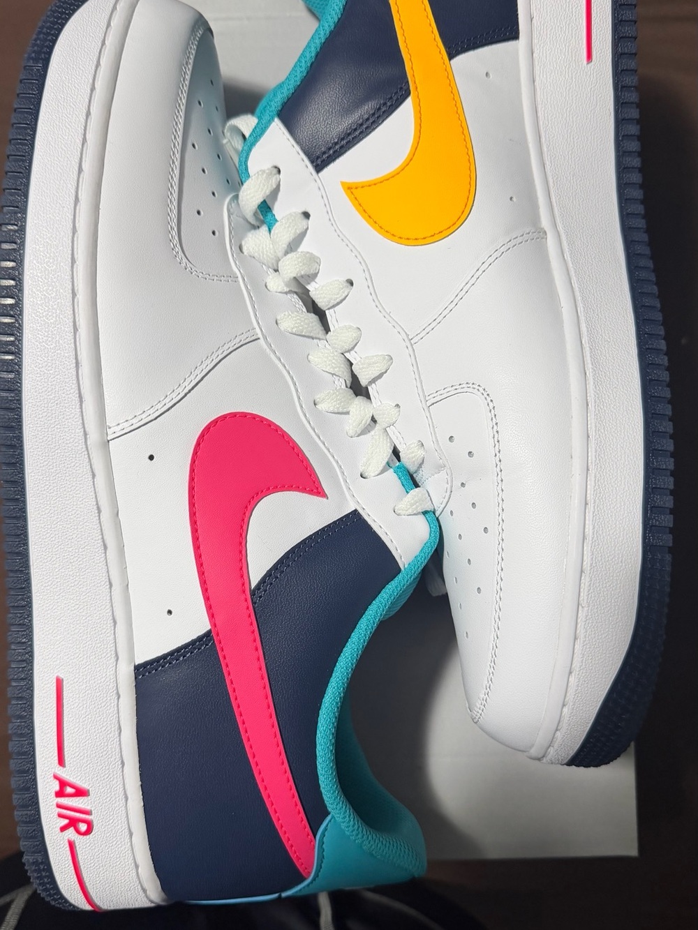 Nike Men’s Low-Top Air Force One White Navy Sneaker with Pink & Yellow Swooshes